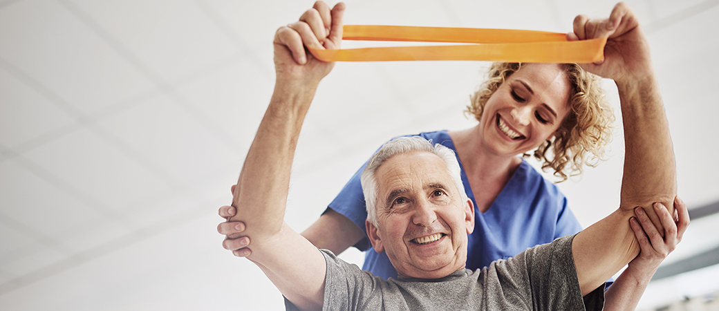 man with physical therapist
